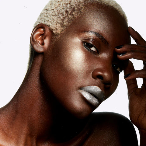 Extra Dimension Skinfinish Highlighter - Whisper of Gilt - .31 oz / 9 g