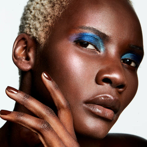 Extra Dimension Skinfinish Highlighter - Show Gold - .31 oz / 9 g