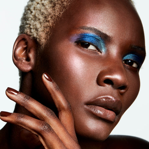 Extra Dimension Skinfinish Highlighter - Show Gold - .31 oz / 9 g